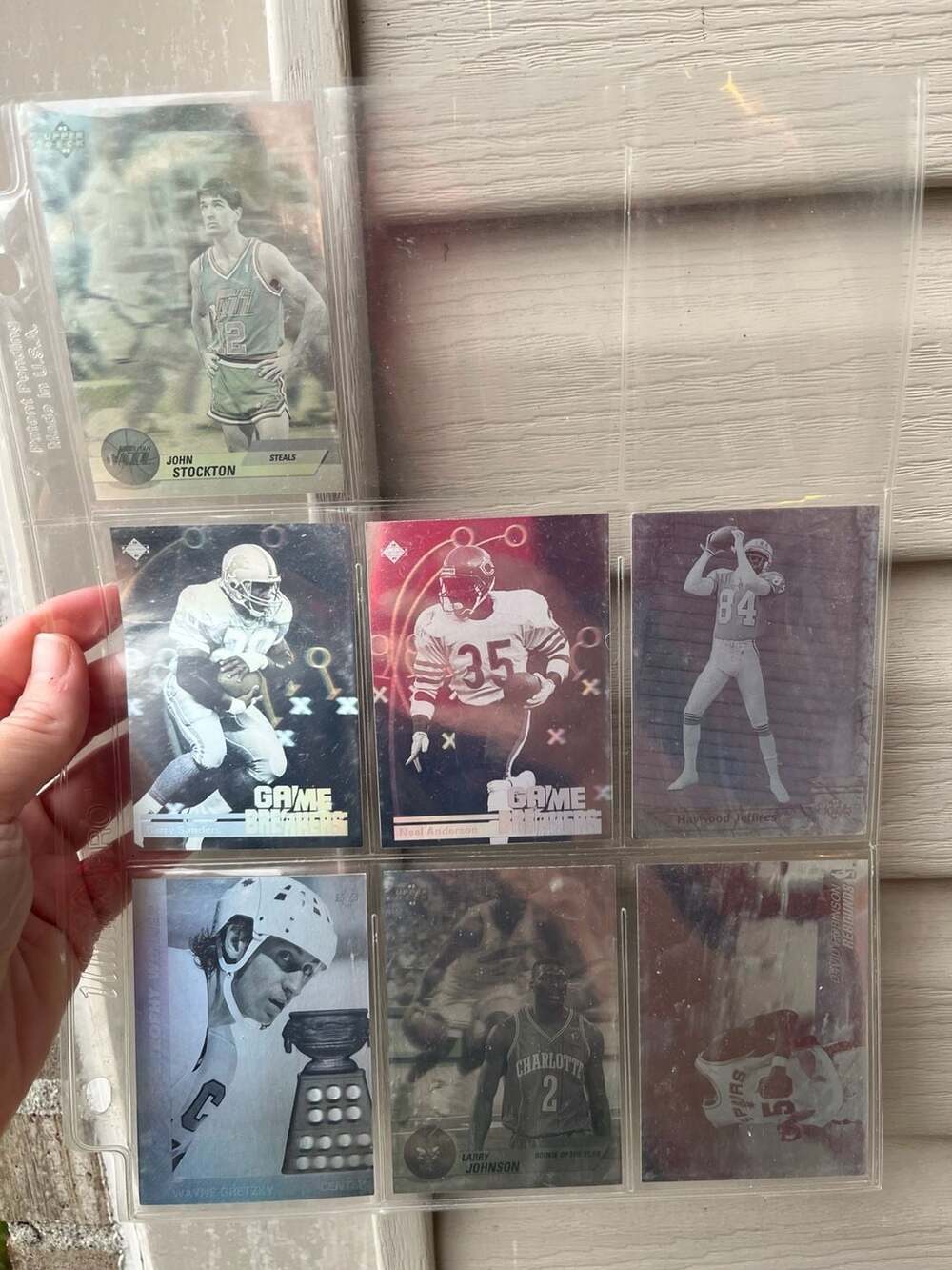 Vintage 1990s NBA, NHL, and NFL Holographic Trading Card Collection